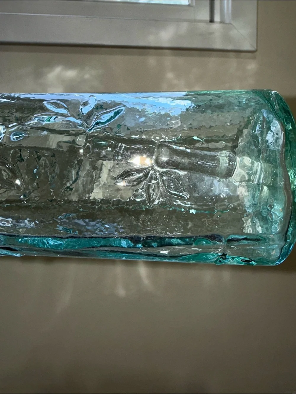 Tell green/aqua color glass bottle daisy flowers and vines pattern 11” height